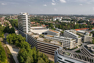 Aerial view of the NEO building complex with roof terrace of the new Baumkirchen Mitte neighbourhood in Munich.