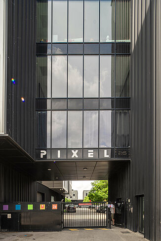 Glass front with subway in the Pôle PIXEL industrial estate in France.