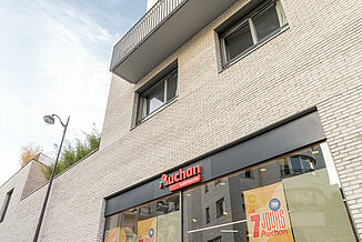 Mixed-use building in Paris Auchan supermarket and flats.