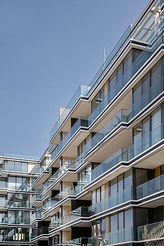 View of the glass façade with the balconies of The Ambassy in Vienna.