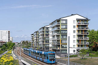 Rörvicksbacken residential complex and a train passing