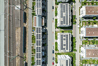 Aerial view of railway tracks directly adjacent to the new Quellenpark development in Bad Vilbel.